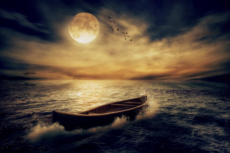 row boat on the ocean with full moon