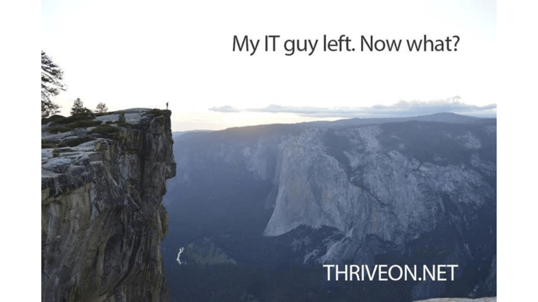 person standing at the edge of a mountain top IT guy left outsource IT