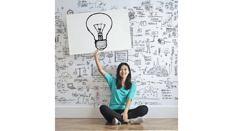 woman holding sign with lightbulb business intelligence