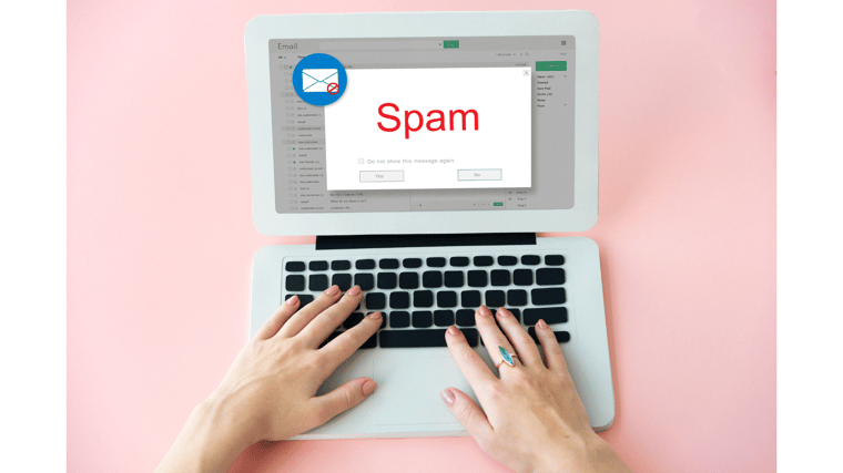 laptop with spam warning email spoofing cybersecurity