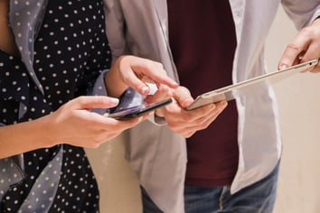 people using devices mobile collaboration with Microsoft Teams
