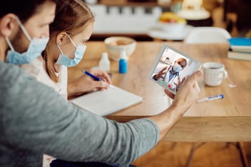 benefits of strong IT infrastructure for telehealth IT infrastructure for telehealth operations family doing telehealth appointment