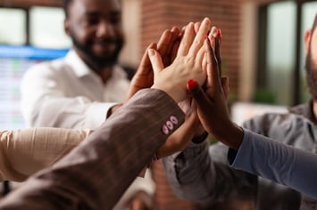 happy-excited-businessteam-celebrating-successful-partnership-enjoying-together-startup-office-diverse-smiling-businesspeople-achievement-business-collaboration-concept-victory