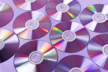 pile of CDs and disks